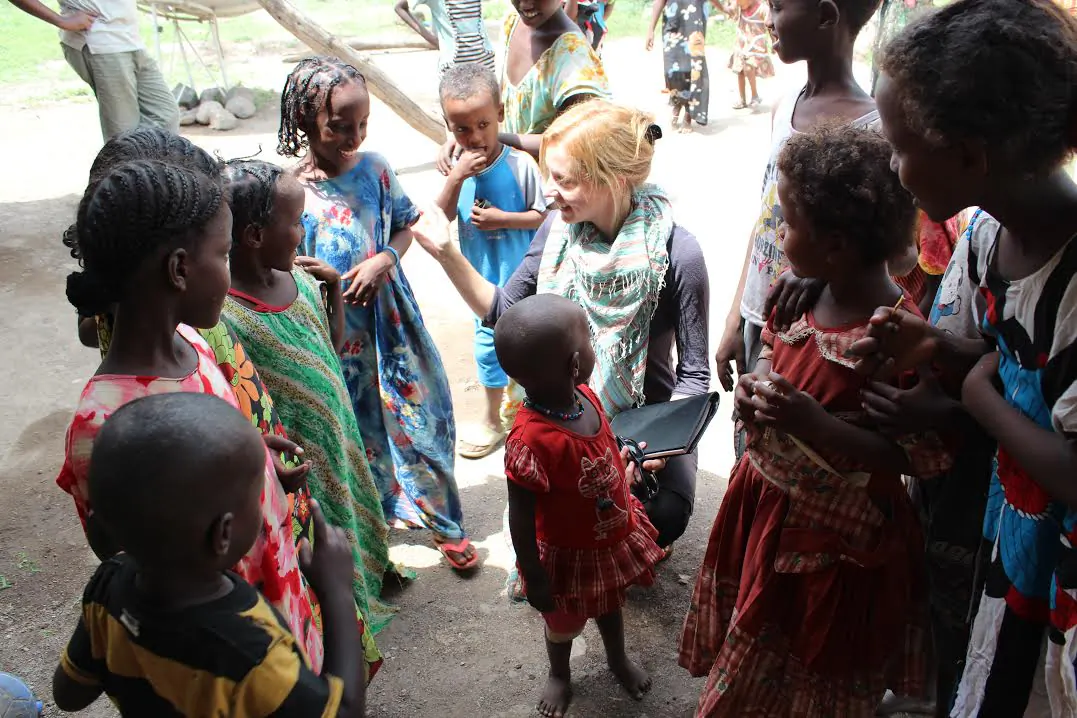 Samantha Nutt, co-founder of War Child North America, helps women and children in a war-torn country in September 2011. (Courtesy of Samantha Nutt) 