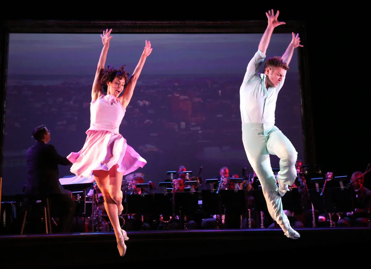Meg Gillentine and Tyler Hanes dance behind Young Woman and Young Man in “A Bed and a Chair: A New York Love Affair.” (Joan Marcus)