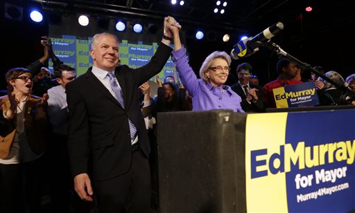 Seattle mayoral candidate state Sen. Ed Murray, left, is cheered by former Gov. Chris Gregoire at an election night party Tuesday, Nov. 5, 2013, in Seattle. Murray challenged incumbent Mayor Mike McGinn in a race where both candidates have been trying to establish themselves as the more liberal choice for voters in the Northwest's largest city. (AP Photo/Elaine Thompson)