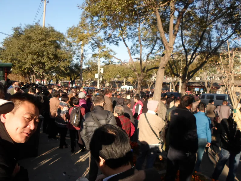 People line the streets outside the three petition office in Beijing, on Nov. 11, 2013. According to observers, tens of thousands of people were in Beijing to petition during the meetings of the Third Plenum of the 18th Central Committee. (Epoch Times) 