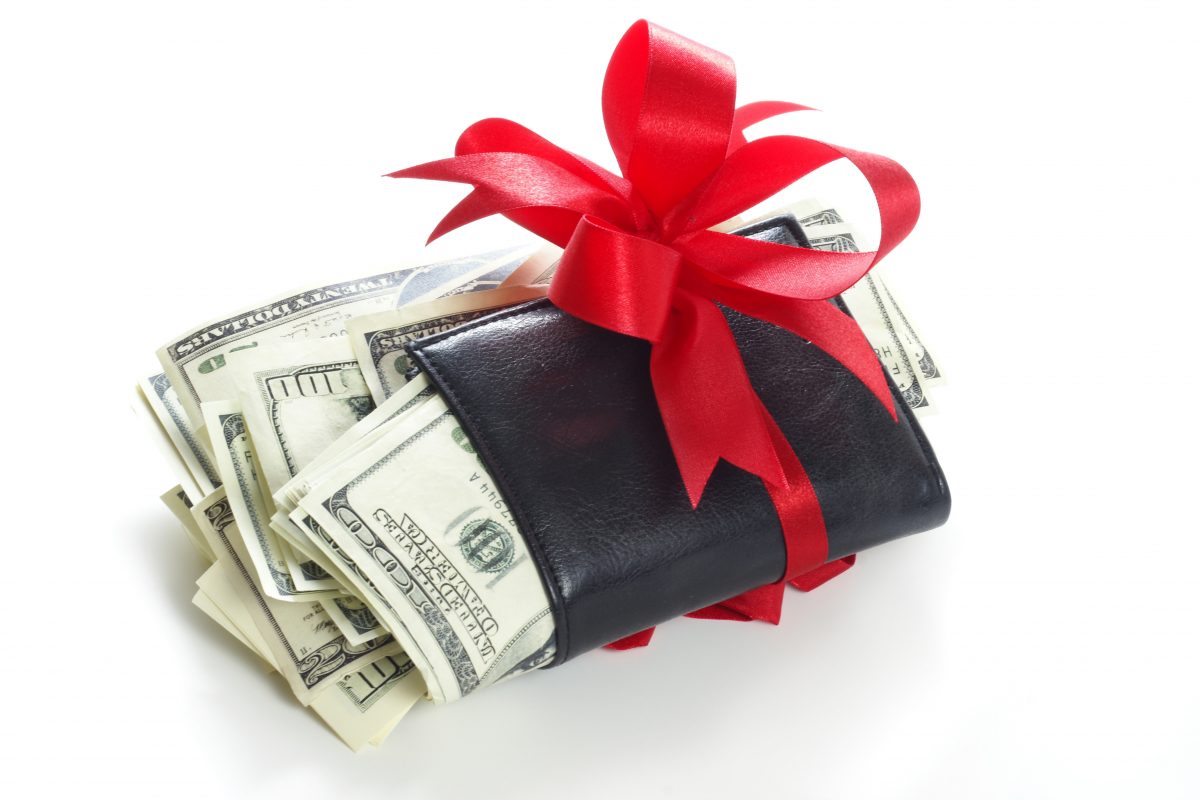Wallet with money Image via Shutterstock