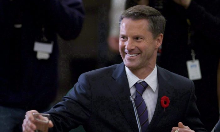 Some think Nigel Wright, former chief of staff for Prime Minister Stephen Harper, has secrets yet untold about the senate expense scandal. (The Canadian Press/Adrian Wyld)
