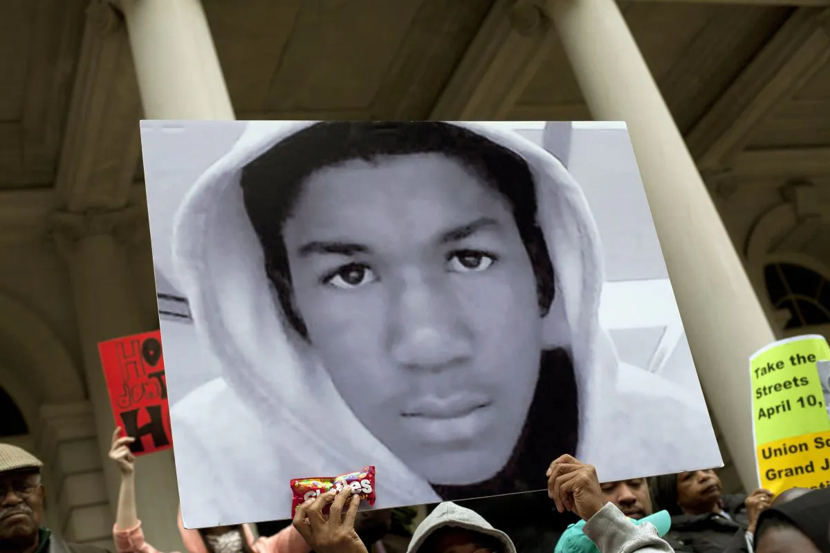 17-year-old Trayvon Martin, who was killed while wearing a hoodie, is seen during a protest in this March 2012 file photo. George Zimmerman was ultimately acquitted of wrongdoing in the death. (Allison Joyce/Getty Images)