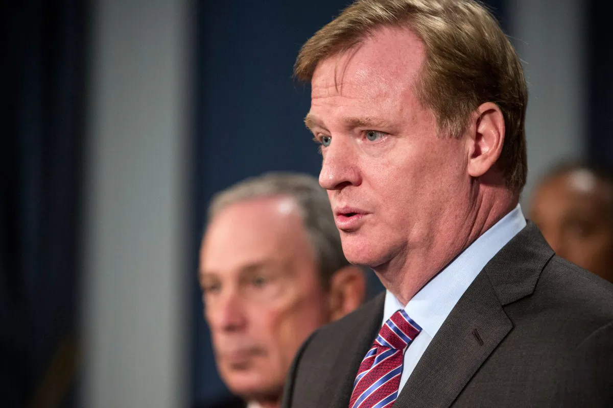NFL Commissioner Roger Goodell (R) speaks at a press conference held by New York Mayor Michael Bloomberg, regarding Super Bowl XLVIII, on Oct. 10 in New York City. The NFL's tax-exempt status is being challenged by politicians and activists. 
(Andrew Burton/Getty Images)

