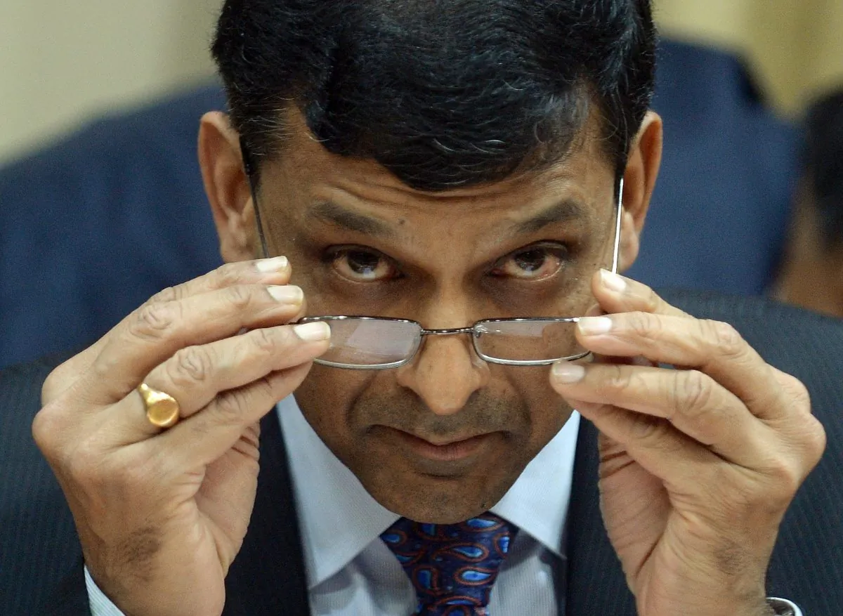 Reserve Bank of India Gov. Raghuram Rajan at a meeting with bankers in Mumbai, Oct. 29. Rajan is working to stem capital flights out of India as the Indian economy cools and its currency rupee drops. (Punit Paranjpe/AFP/Getty Images)