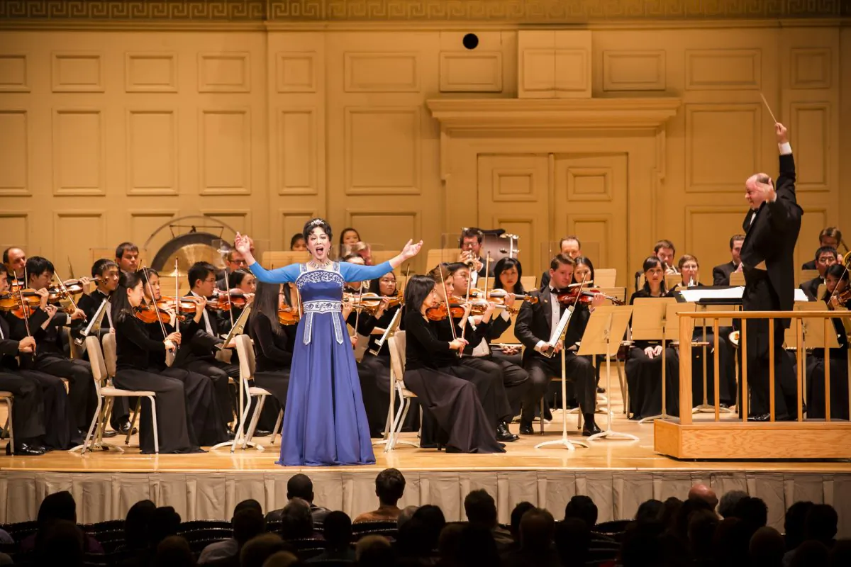 Shen Yun Symphony Orchestra soprano Min Jiang sings "Heavenly Secret" at the Boston Symphony Hall on Oct. 9, 2013. The orchestra is the only one in the world that combines classical Western and Chinese instruments as its permanent members. (Edward Dai/Epoch Times)