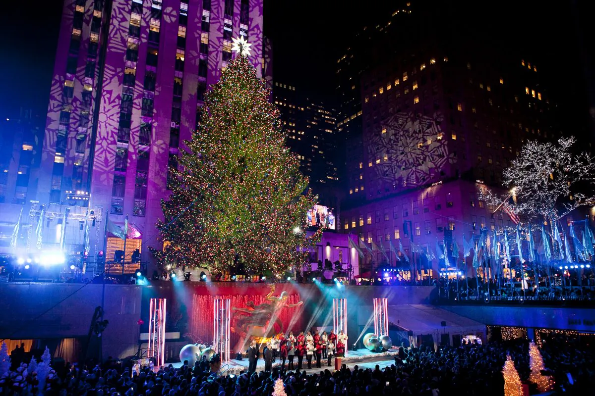 The 76-foot-tall tree is lit with 45,000 lights during the 81st Annual Rockefeller Center Christmas Tree Lighting Ceremony in New York on Dec. 4, 2013. This year, the Christmas tree will be an 85-foot, 13-ton Norway spruce. (Samira Bouaou/Epoch Times)