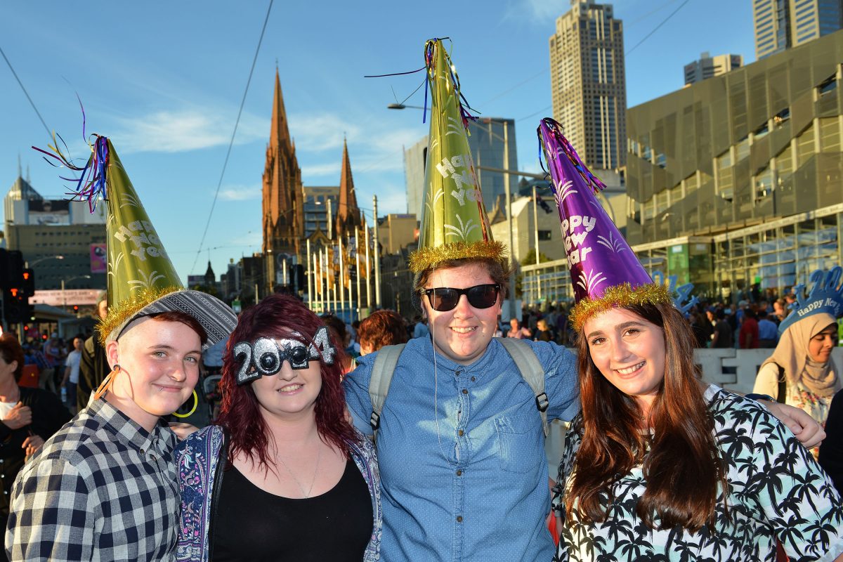 People celebrate New Year's Eve on December 31, 2013 in Melbourne, Australia. (Vince Caligiuri/Getty Images)