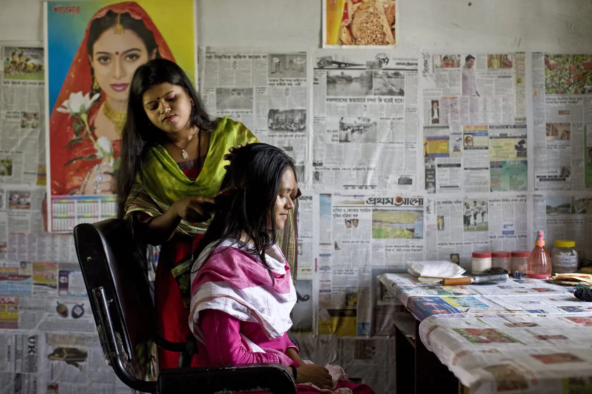 Two girls in rural Bangladesh, Aug. 8, 2008. The Nike Foundation for Girls has given out microloans to selected girls in disadvantaged communities who use the money to better their lives and those of their families. (Brent Stirton/Getty Images)