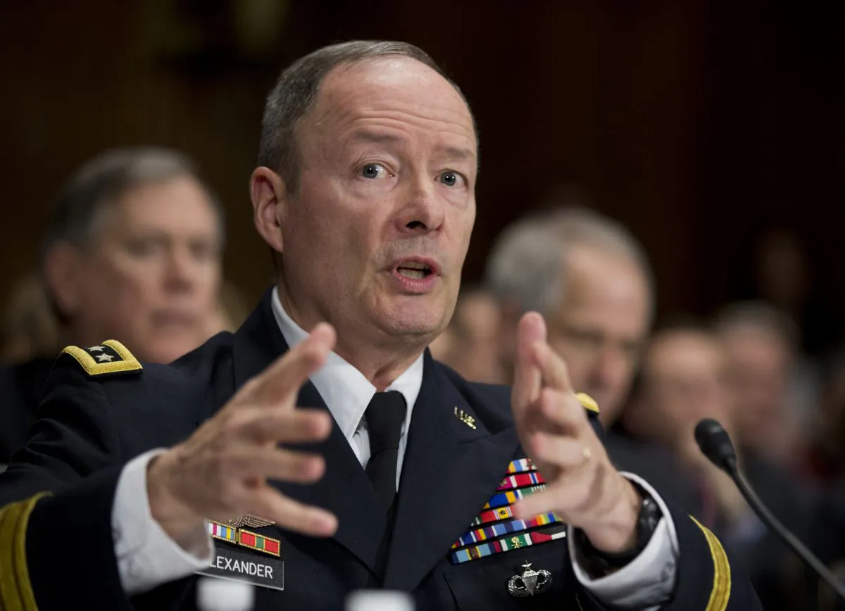 National Security Agency Director Gen. Keith Alexander testifies on Capitol Hill in Washington on Dec. 11. A White House task force recommends new limits on surveillance. (Manuel Balce Ceneta/AP)

