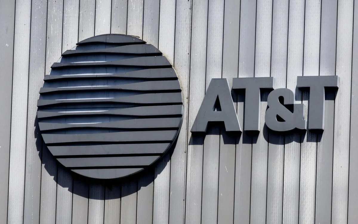 The AT&T logo and initials sit atop their building 18 August, 2006, in Arlington, Virginia. (Paul J. Richards/AFP/Getty Images)
