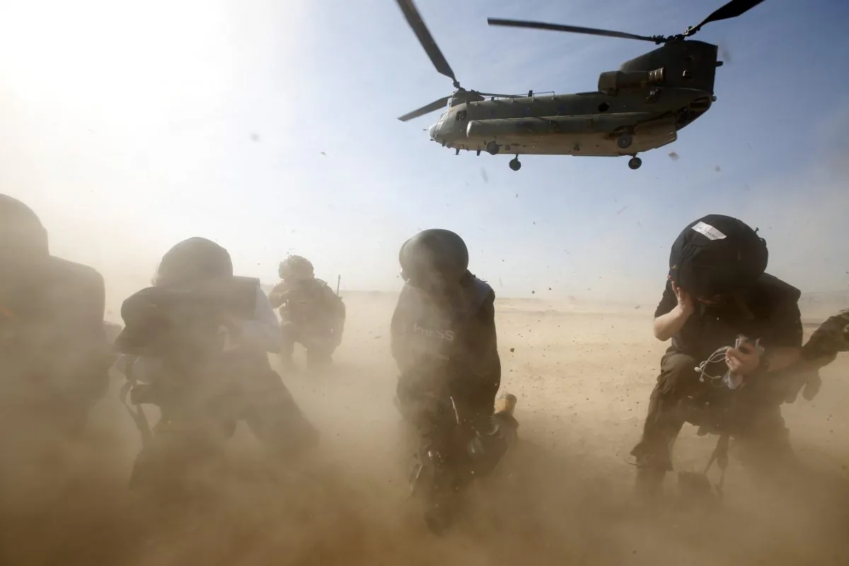 A British forces transport helicopter lands at the forward operating base Sterga II in Helmand Province, Afghanistan, on Dec. 16, 2013. (Lefteris Pitarakis/Getty Images)