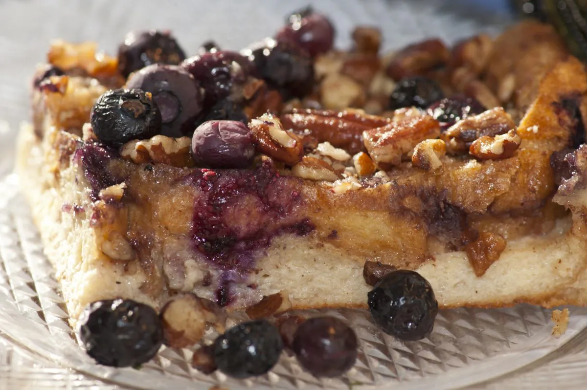 This southern-style baked French toast is topped with butter, sugar, pecans and blueberries.(Cat Rooney/Epoch Times)