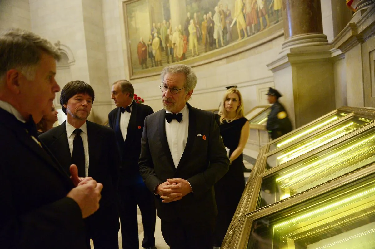 (L-R) Archivist of the United States The Honorable David S. Ferriero, Foundation for the National Archives Board Vice President and Gala Chair Ken Burns, and filmmaker and honoree Steven Spielberg view the Constitution of the United States at the Foundation for the National Archives 2013 Records of Achievement award ceremony and gala in Washington, D.C. on Nov. 19, 2013. (Michael Loccisano/Getty Images for Foundation for the National Archives)