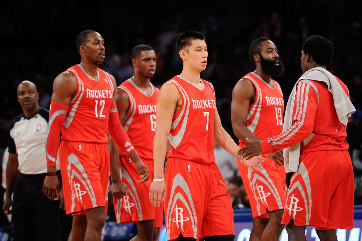Jeremy Lin #7 of the Houston Rockets walks off the court with teammates Dwight Howard #12, Terrence Jones #6 and James Harden #13 during a timeout at Madison Square Garden on November 14, 2013 in New York City. The Rockets defeat the Knicks 109-106. (Maddie Meyer/Getty Images) 
