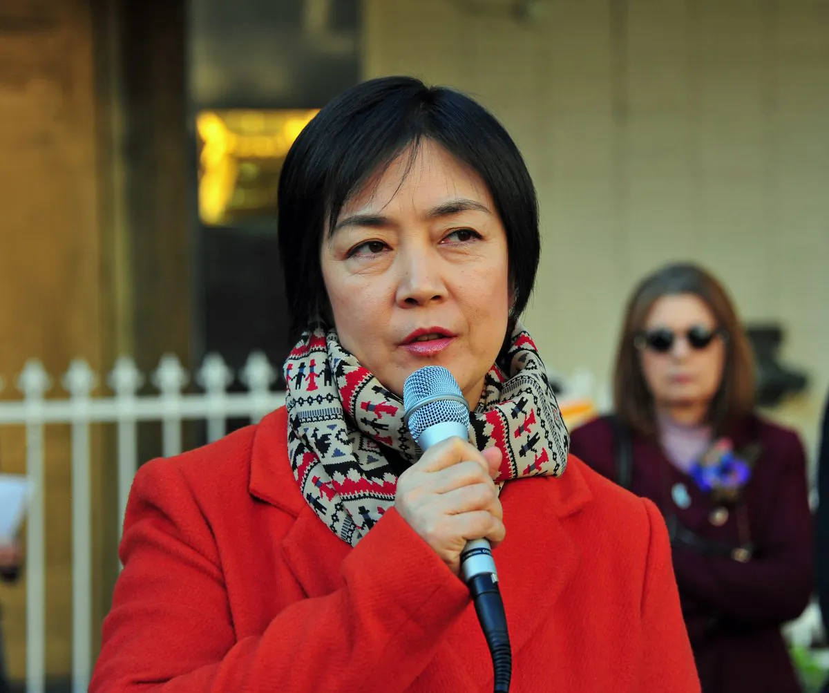 Jennifer Zeng, a best-selling author who was featured in the award-winning film “Free China,” spoke at the rally on Dec. 10 in Los Angeles, Calif. Zeng was victim of the persecution of Falun Gong in China. (Robin Kemker/The Epoch Times)