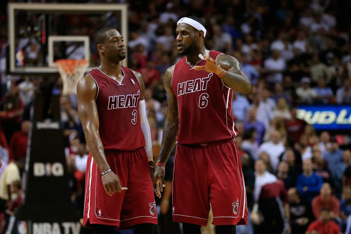 Dwyane Wade #3 and LeBron James #6 of the Miami Heat on court against the Indiana Pacers at American Airlines Arena on December 18, 2013 in Miami, Florida. (Chris Trotman/Getty Images)
