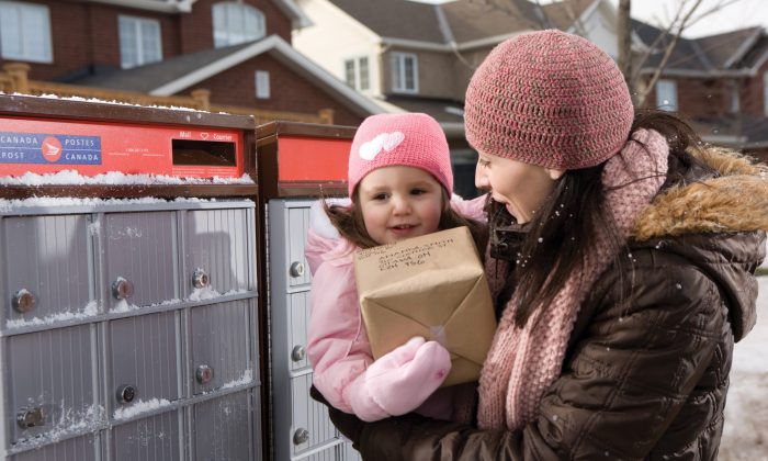 Parliament's transport committee held an emergency meeting to look into Canada Post's decision to stop home delivery for five million Canadian households. To save costs, home delivery will be replaced by community mail boxes. (Canada Post)