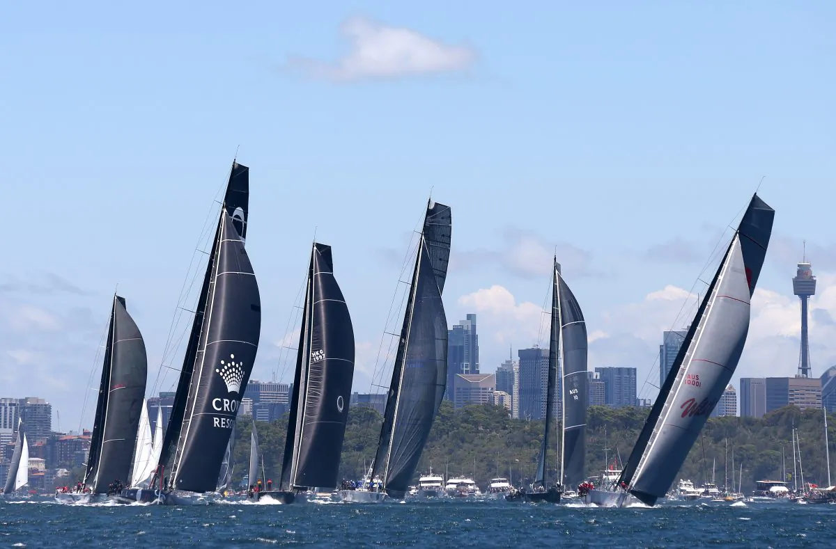 Some of the bigger boats lead the field in Sydney Harbour just after the start of the Sydney Hobart yacht race Thursday, Dec. 26, 2013. Race officials are warning the fleet to expect gale-force winds and waves of up to 12 meters (40 feet) during the race that covers 628 nautical miles, or 1,163 kilometers (723 miles). (AP Photo/Rick Rycroft)