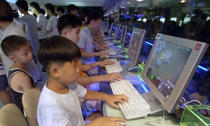 Dozens of South Korean cyber gamers get computer time at the TJB StarCraft cyber game tournament, file photo, Aug. 18, 2001. The online gaming craze in South Korea has lasted for years. South Koreans are currently debating a new bill that defines Internet gaming as a source of addiction similar to gambling, alcohol, and drugs.  (Kim Jae-Hwan/AFP/Getty Images).