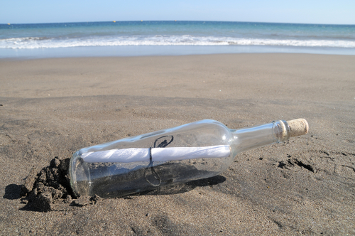 A file photo of a message in a bottle. A boy in Chile found a message in a bottle washed ashore in December, 2013, cast off by an Australian boy two years earlier. (Shutterstock*)