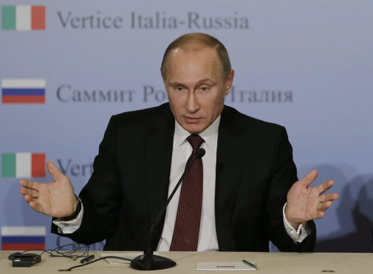 Russian President Vladimir Putin speaks to the media during a bilateral meeting between Italy and Russia on Nov. 26, 2013. Putin directed the Russian military to put special emphasis on the Arctic after Canada made a claim on the North Pole. (AP Photo/Luca Bruno)