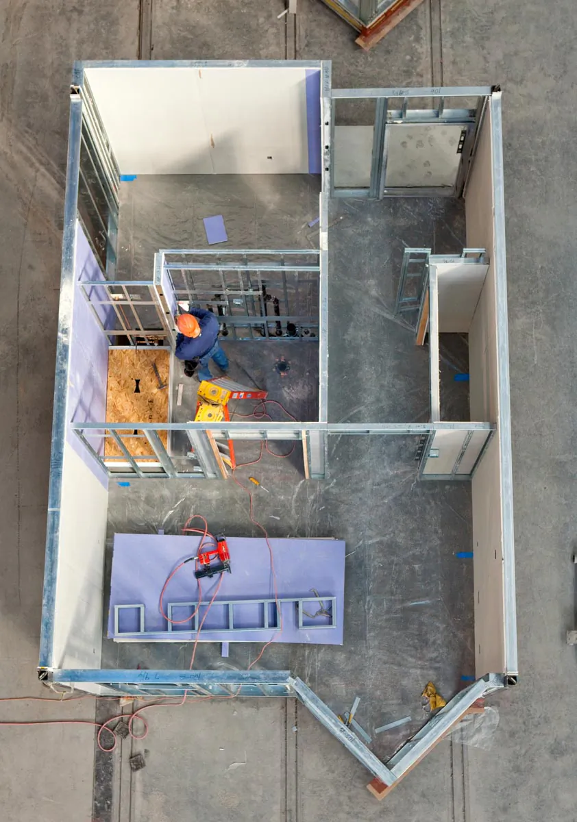 A Capsys employee works on a modular unit in Capsys's factory at the Brooklyn Navy Yard. (Courtesy of Capsys)