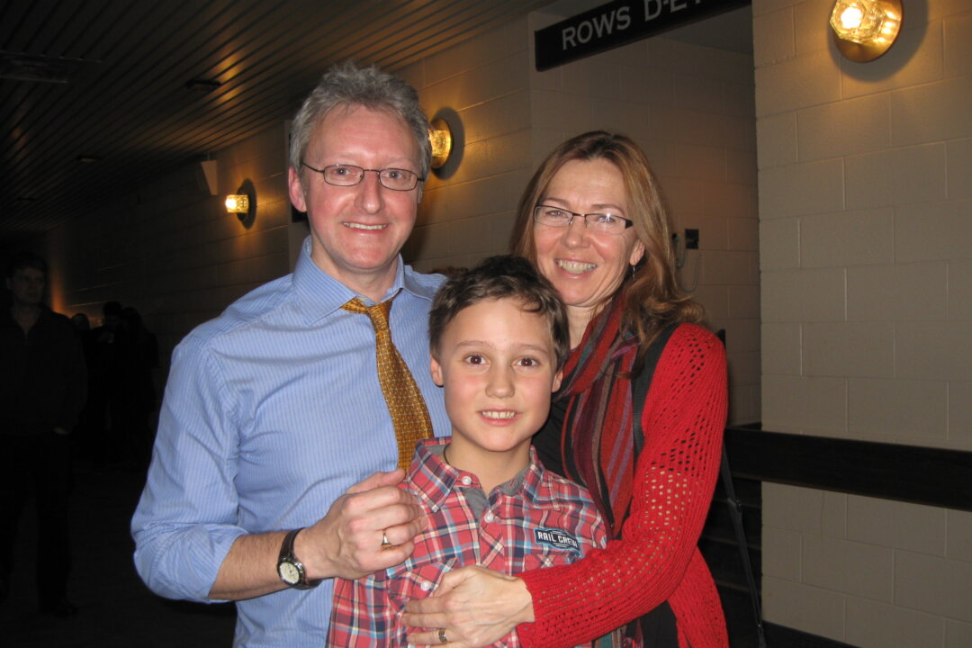 The Griffiths-Fulton family, parents Karl and Lynne and their son, Tegan, took in Shen Yun's Wednesday night performance at Centre In The Square theatre in Kitchener on Jan. 14, 2014. (Allen Zhou/Epoch Times)
