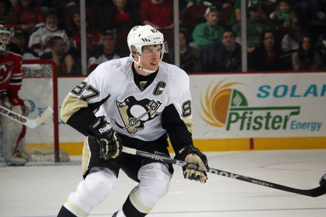 In his second game back from a concussion, Sidney Crosby of the Pittsburgh Penguins skates against the New Jersey Devils in Newark, New Jersey March 2012. There are around 1.7 million traumatic brain injuries each year in the United States, with a growing number of older adults being affected. (Bruce Bennett/Getty Images)