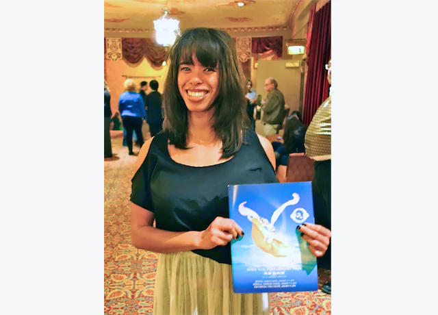 During Shen Yun’s intermission on Jan. 7, Koura Wright glided through the Tennessee Theatre mezzanine with a friend, smiling and talking. (Mary Silver/Epoch Times)