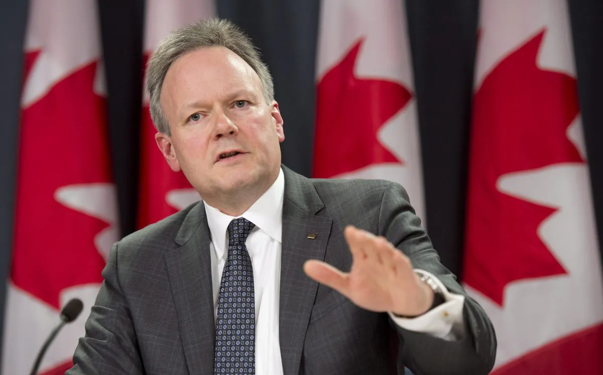 Bank of Canada Governor Stephen Poloz speaks with the media following an interest rate announcement, Wednesday, Jan. 22, 2014, in Ottawa. (The Canadian Press/Adrian Wyld)