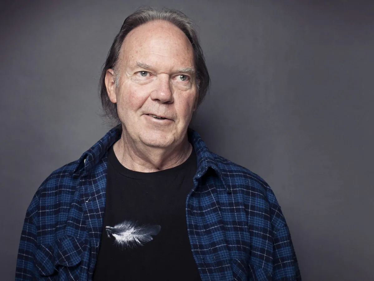 Singer-songwriter Neil Young posing for a portrait at The Carlyle hotel in New York in this file photo from 2012. (Victoria Will/Invision/AP, File)