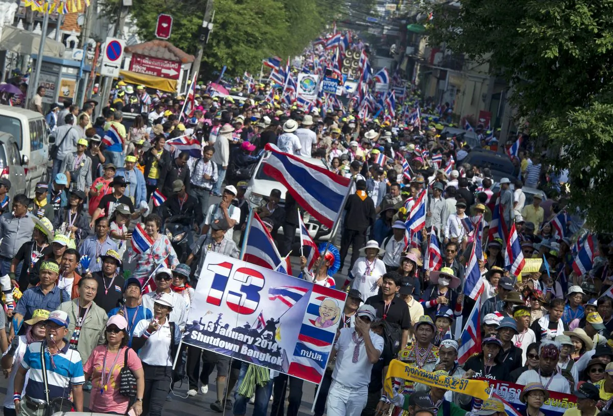 Thousands of Thai opposition protesters marched through Bangkok on Jan 5 to demand the prime minister step down, in a 'warm-up' for their planned occupation of the city.

(Pornchai Kittiwongsakul/AFP/Getty Images)