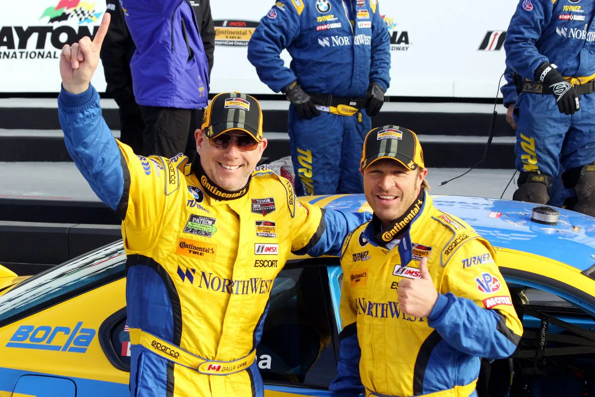 Paul Dalla Lana and Bill Auberlen celebrate winning the CTSCC season opener, the BMW Performance 200 at Daytona International Speedway Friday afternoon. (Chris Jasurek/Epoch Times)