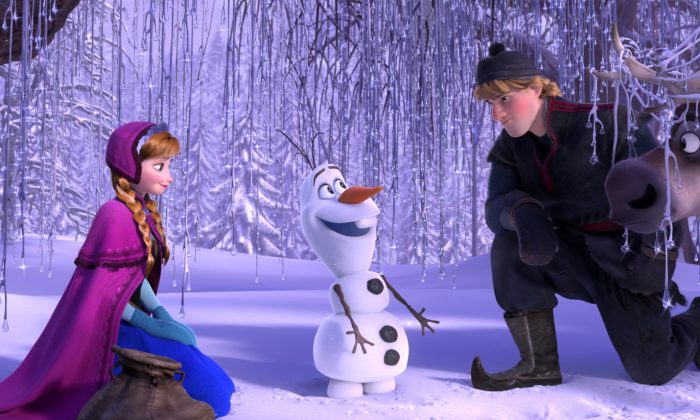 This image released by Disney shows, from left, Anna, voiced by Kristen Bell, Olaf, voiced by Josh Gad, and Kristoff, voiced by Jonathan Groff in a scene from the animated feature "Frozen." "Frozen's" grip on the domestic box office is heading for a meltdown as the combat docudrama "Lone Survivor" threatens a firefight for the top spot with an expected gross of $15 million. (AP Photo/Disney)