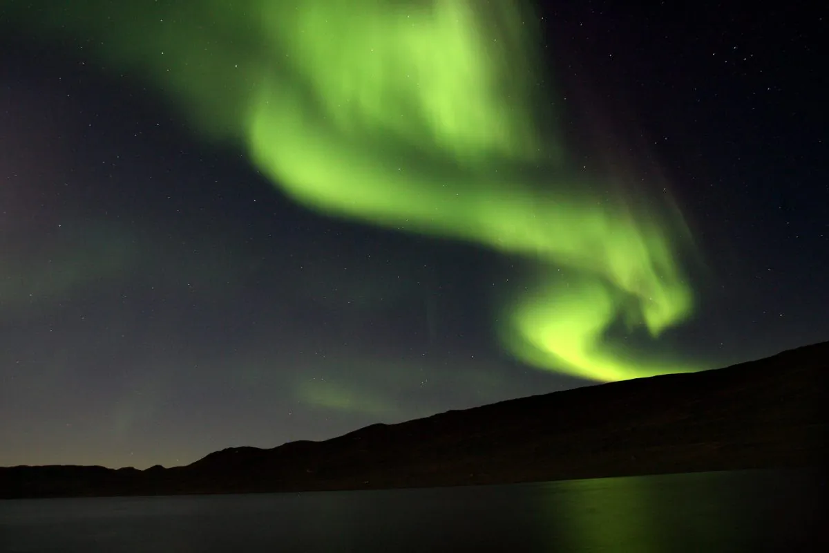 A solar flare is hitting the Earth this week and that means the Aurora Borealis, also known as the Northern Lights, may appear in London, Washington, Oregon, New Jersey, and New York.   (Uriel Sinai/Getty Images)