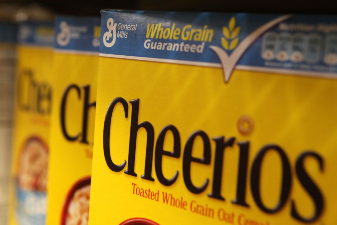 Boxes of Cheerios cereal, made by General Mills, sit on the shelf at a grocery store September 23, 2009 in Berkeley, California. (Photo by Justin Sullivan/Getty Images)