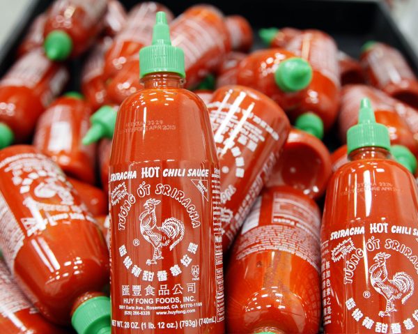 Sriracha chili sauce bottles produced in Irwindale, Calif., Oct. 29, 2013. (AP Photo/Nick Ut, File)