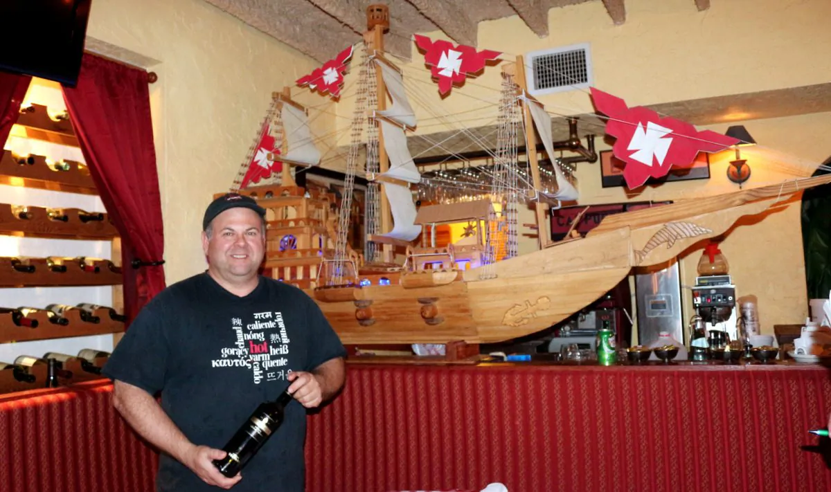 Bayside Grille owner Robert DiGiorgio. Bayside Grille and Cafe Largo are two separate restaurants in separate buildings on the same property in Key Largo, Florida. Bayside Grille overlooks the bay with a dock for boaters. (Myriam Moran copyright 2014)