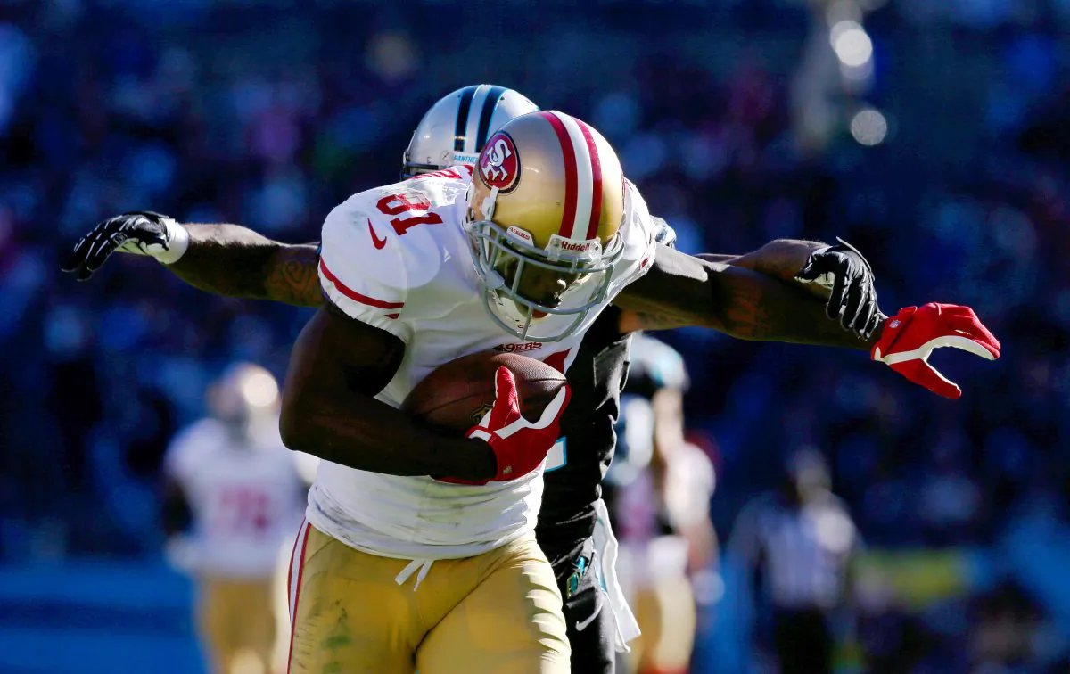 Anquan Boldin #81 of the San Francisco 49ers runs after a catch against Captain Munnerlyn #41 of the Carolina Panthers in the third quarter of the NFC Divisional Playoff Game at Bank of America Stadium on January 12, 2014 in Charlotte, North Carolina. (Ronald Martinez/Getty Images)