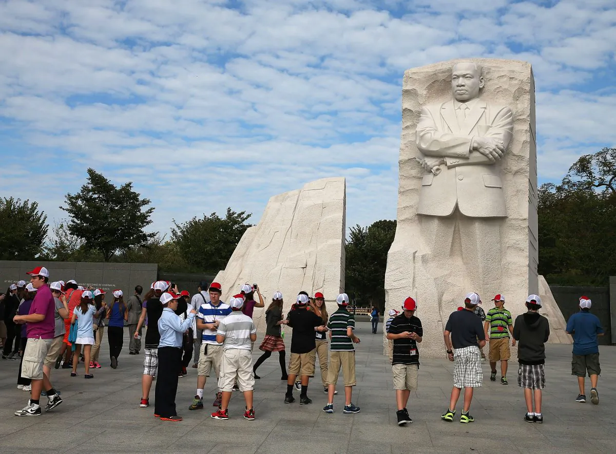 Tourists gather at the Martin Luther King Memorial one day after a bipartisan bill was passed by the House and the Senate to reopen the government and raise the debt limit, on October 17, 2013 in Washington, DC. (Mark Wilson/Getty Images)