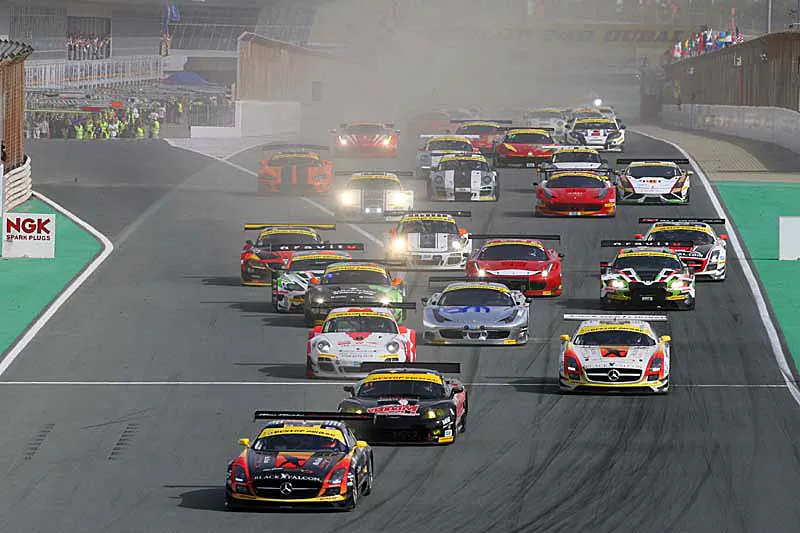 Jeroen Bleekemolen in the #1 Team Abu Dhabi by Black Falcon 1 Mercedes SLS AMG GT3 passes Nick Pastorelli in the #21 V8 Racing Corvette C6-R at the start of the 2014 Dunlop Dubai 24-hour race. (http://live.24hseries.com)