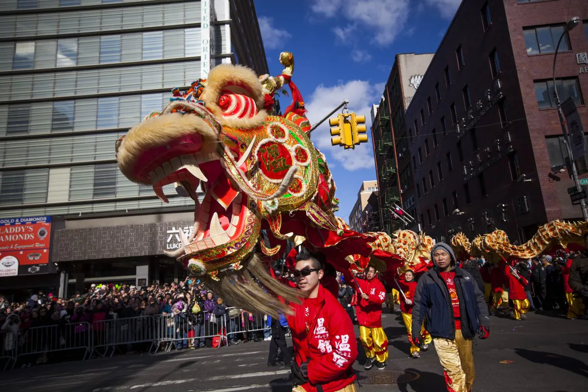 Dragon dancers cross Canal Street during the 14th Annual Chinatown Lunar New Year parade on February 17, 2013 in New York City. (Michael Nagle/Getty Images)