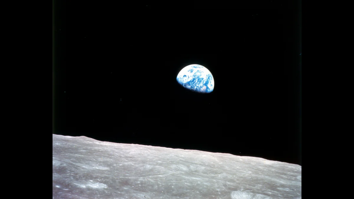 The Earth is seen from the moon on Dec. 24, 1968, in a photograph taken during the Apollo 8 mission. Private companies, as well as China and Russia, are now eyeing the moon as a resource for minerals. (NASA)