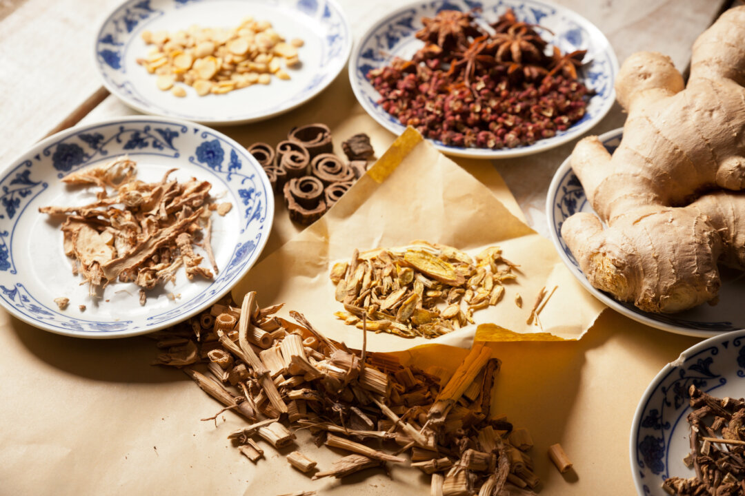 Chinese herbs and acupuncture can safely treat many symptoms of menopause. (Fotolia)