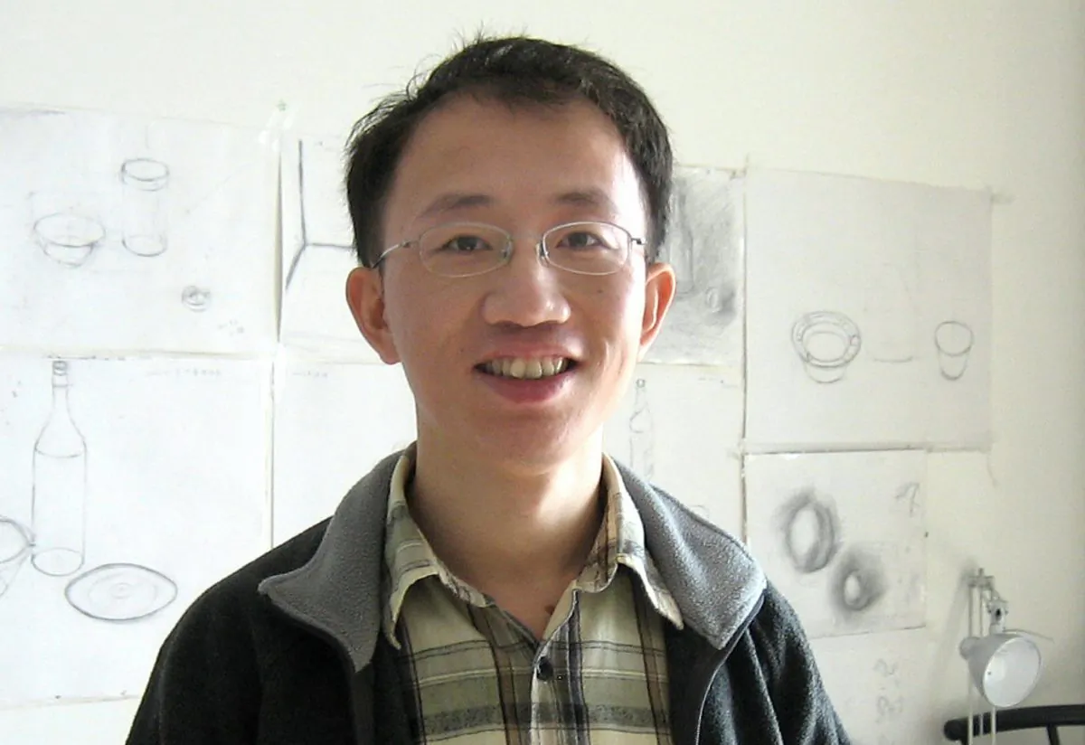 Hu Jia, a high-profile civil rights activist, welcomes a foreign journalist to his home in Beijing on Jan. 3, 2007. Hu has been threatened with a lengthy prison sentence for his activism. (VERNA YU/AFP/Getty Images)