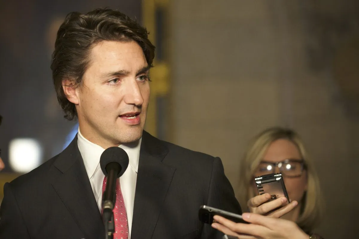 Liberal leader Justin Trudeau speaks to reporters the same week his party voted against an NDP motion to eject senators from caucus last October. Trudeau announced Wednesday that he has now taken that step in an effort to decrease partisanship in the Red Chamber. (Matthew Little/Epoch Times)