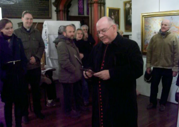 Rev Canon Leonard Doolan, Vicar of Cirencester, opening the Art of Zhen Shan Ren International Exhibition at the Town Hall, upstairs in the Church of St. John the Baptist.