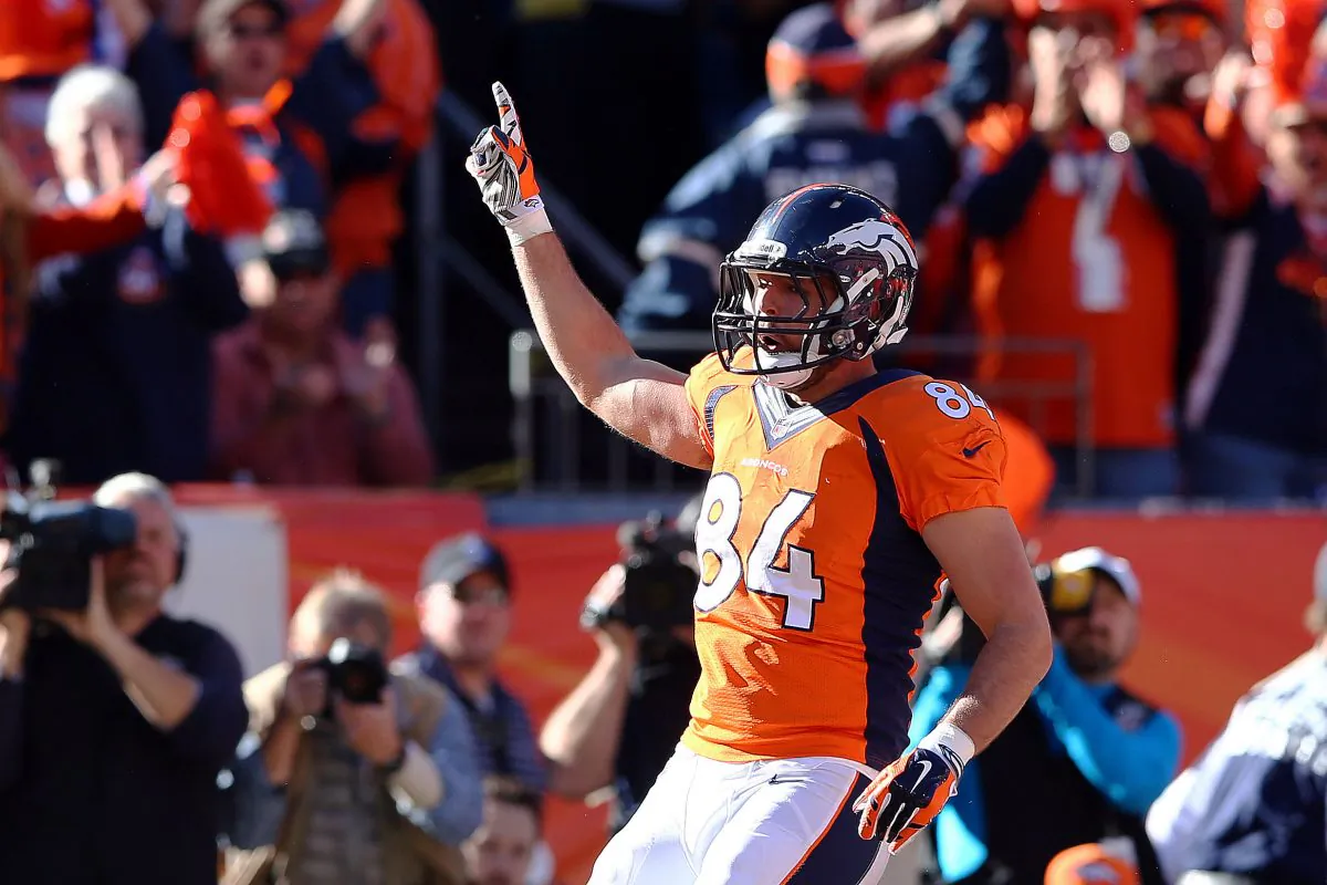 Jacob Tamme #84 of the Denver Broncos celebrates his second quarter touchdown against the New England Patriots during the AFC Championship game at Sports Authority Field at Mile High stadium in Denver, Colorado on January 19, 2014. (Elsa/Getty Images)