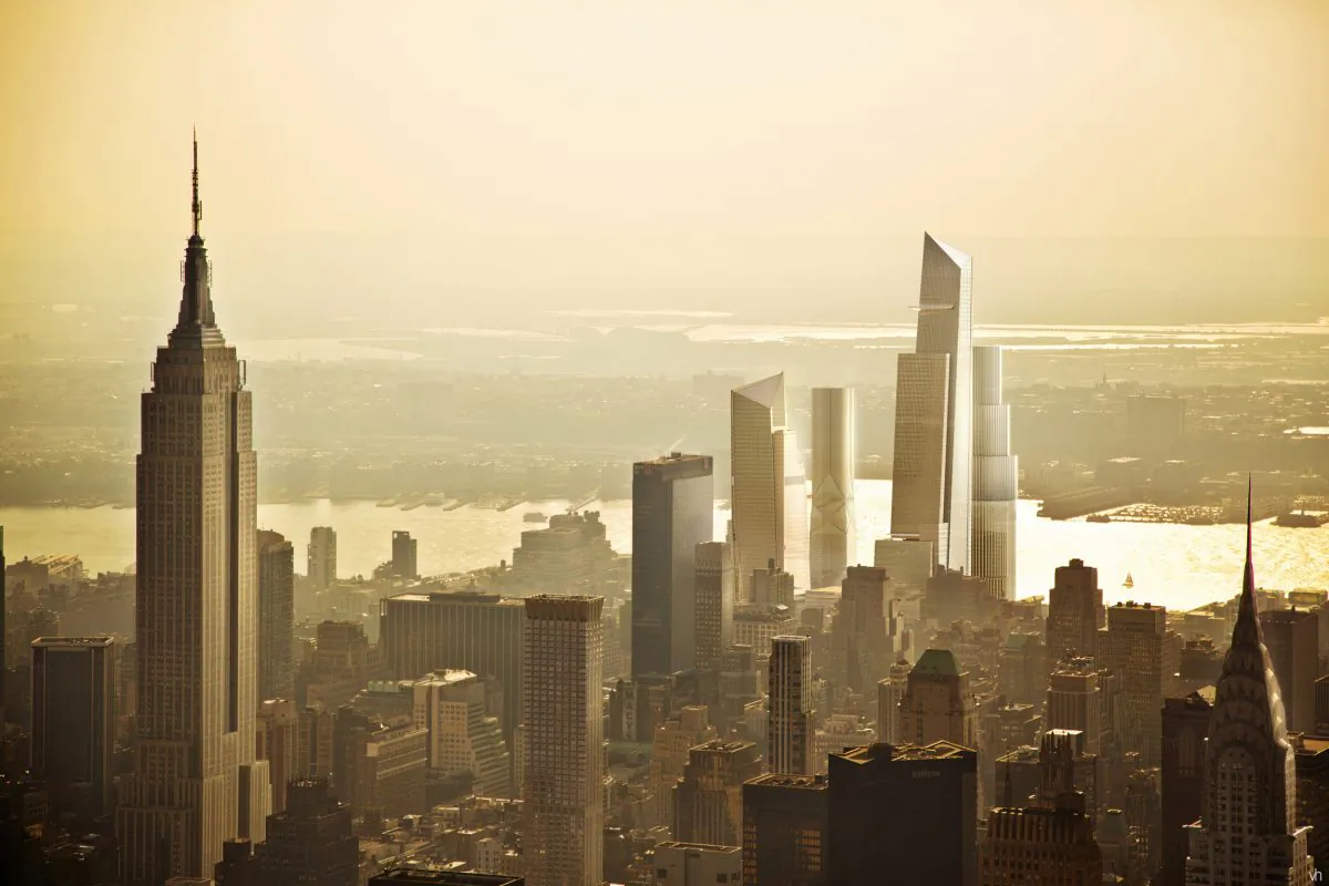 An artist rendering of the Hudson Yards redevelopment as it will look from Midtown Manhattan, New York. Time Warner Inc. announced Jan. 16, 2014 that it's planning to move its headquarters to Hudson Yards at 10th Avenue and West 33rd Street. (AP/Visualhouse via Hudson Yards)